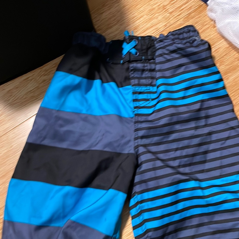 Two swim trunks and one rash guard boys size large 12/14
